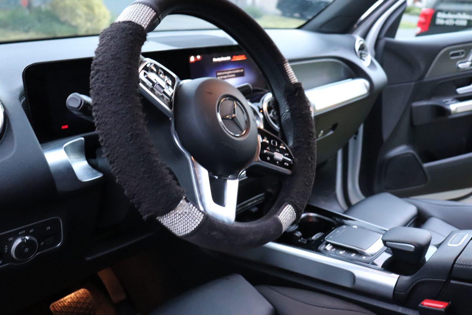 Wide view of a spotless Mercedes driver cockpit